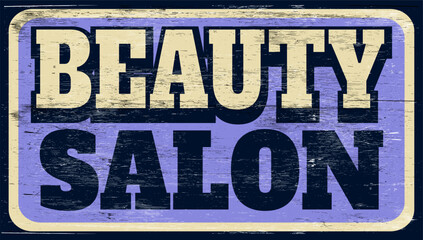 Aged and worn beauty salon sign on wood