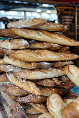 Paris,France - October 6, 2024: Baguette or a long, thin, crusty French bread sold at a marche in Paris, France