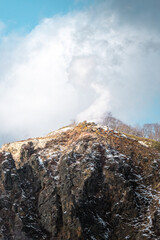 Steam hot springs and snow scene in Noboribetsu Hell Valley, Hokkaido, Japan