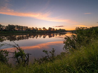 Sunset by the River with Reflections