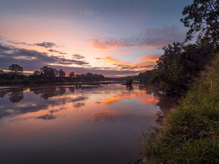 Sunset by the River with Reflections