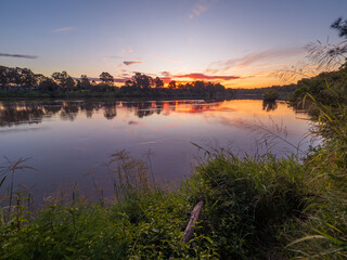 Sunset by the River with Reflections