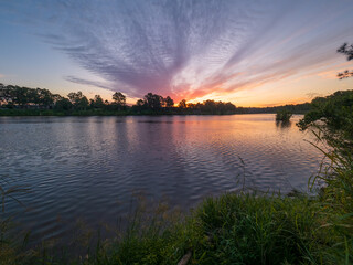 Sunset by the River with Reflections