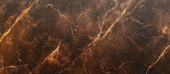 Earthy brown marble texture with golden veins and natural abstract patterns