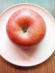 Portrait of an apple on the table