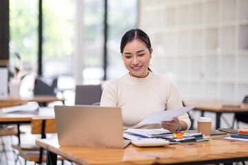Business financing accounting banking concept. Business woman hand doing finances and calculate on...