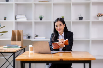 Businessman working at office with documents on his desk, doing planning analyzing the financial report, business plan investment, finance analysis concept
