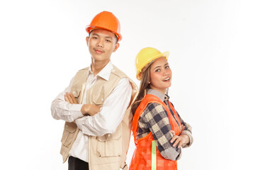 male and female architects smiling in hard hat arm crossed