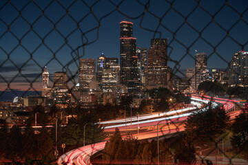 Seattle Skyline Through the Fence - Powered by Adobe