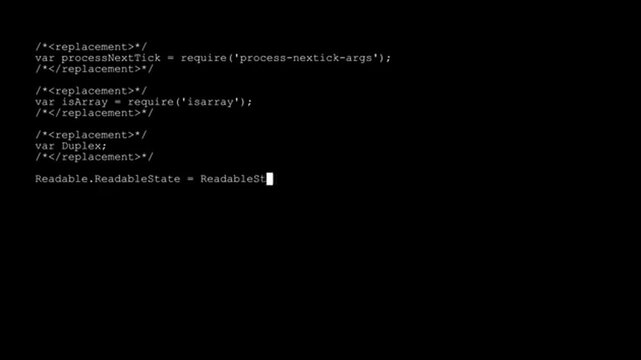 Video of program code scrolling across black computer monitor screen