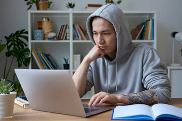 Gen Z student participating in an online class from home