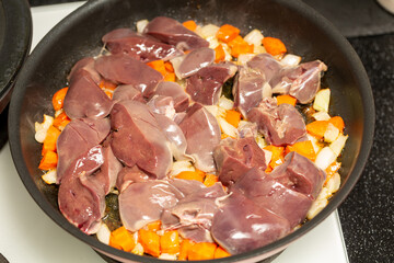Roasting turkey liver with vegetables, making pate
