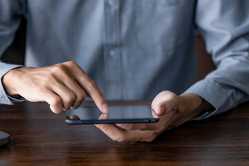Businessman using digital tablet create business idea at home office
