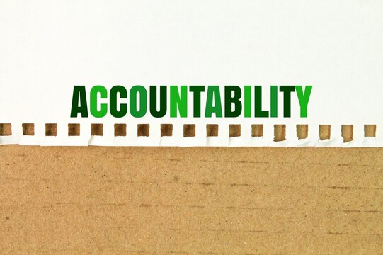 paper with the word ACCOUNTABILITY. concept of responsibility. responsibility for one's actions and decisions and being accountable for their outcomes