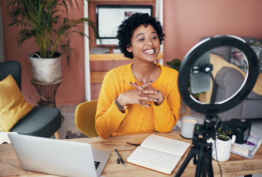 Phone, live streaming and smile with woman in home for social media, content creator and influencer. Study vlog, college tips and student advice with person for broadcast, filming and presenter - Powered by Adobe