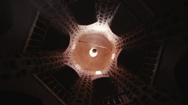 Architectural marvel of the Pigeon Tower in Yazd, Iran. This stunning structure, designed to house thousands of pigeons, showcases traditional Persian ingenuity and desert aesthetics.