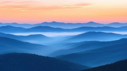 Fototapeta premium Serene Panoramic View of Misty Mountains at Dawn