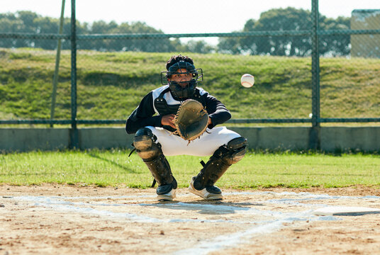 Man, baseball and athlete to catch ball on field, outdoor pitch and training or practice. Male person, player and sports competition or fitness tournament, pitcher and score at match or game in arena
