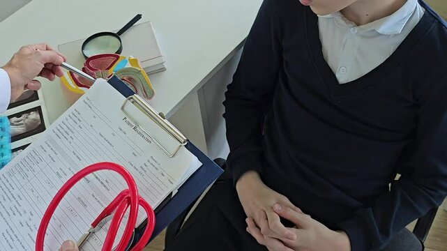 Urologist and male patient at a medical consultation with a potency problem