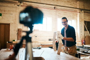 Live streaming, workshop and carpenter tutorial with wood for builder maintenance video for social media. Man, diy and lumber for woodworking vlog, content creator and carpentry with online education
