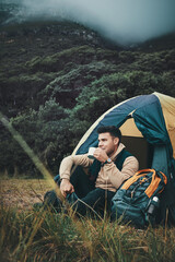Peace, camping and coffee with man on mountain for explore, travel and adventure. Challenge, wellness and thinking with person and tent in nature for backpacking vacation, fitness and environment