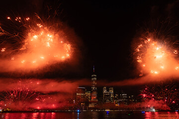 New York Manhattan fireworks. New York Fireworks over Manhattan. New York City 4th of July Fireworks. New York City Skyline Manhattan with Flashing Fireworks. Independence day.