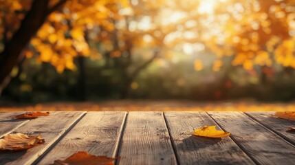 Empty wooden table with a blurred backdrop of autumn foliage