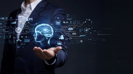 Businessman holding a digital brain with technical background.