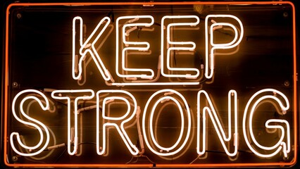 Neon sign with the message Keep Strong.