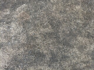 This image features a versatile concrete background, showcasing a textured surface that highlights the raw and industrial beauty of concrete.