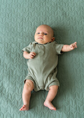 Fototapeta premium Portrait of Infant. Healthy physical and mental development of child. newborn baby in first months of life