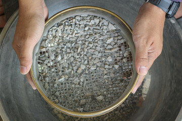 Laboratory, Standard Testing Method for aggregate Lumps and Friable Particles in Rock Aggregates in...
