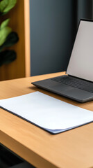 Modern workspace setup sleek laptop on minimalist desk with blank notebook and greenery in background