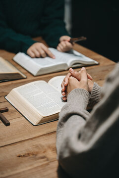 Christians are congregants join hands to pray and seek the blessings of God.