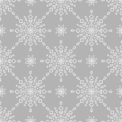 Vector seamless pattern with hand drawn snowflakes in scandinavian style. Design for Christmas wrapping paper, textile and backgrounds.