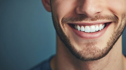 Fototapeta premium Perfectly white teeth in a slight smile on a man