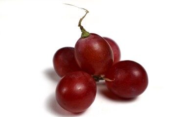 red grapes isolated on white