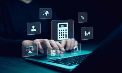 Hand using a laptop with TAX REFUND and refund tax of duty taxation business, graphs and chart being demonstrated on the screen media,  tablet pc and selecting tax refund, Saving tax for business