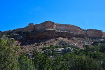 Fototapeta premium Rocky cliff under blue sky