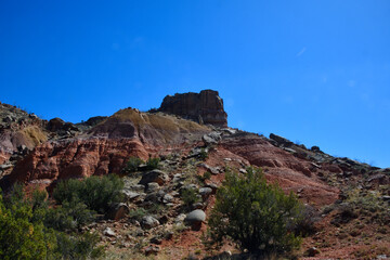 Fototapeta premium Rugged desert landscape with red rocks