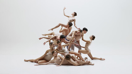 Group of ballet dancers captured in dynamic and expressive pose, highlighting artistic beauty and...