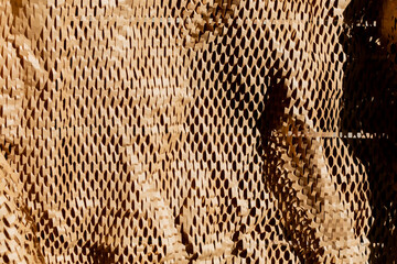 A close-up of honeycomb-patterned cardboard, ideal for sustainable packaging concepts and eco-friendly Christmas gift wrapping solutions