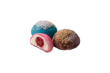Delicious colorful asian mochi sweets with rice dough shell and fruit filling