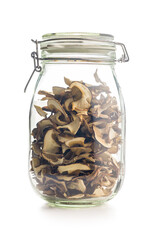 Dried porcini mushrooms. Sliced boletus in jar isolated on white background.