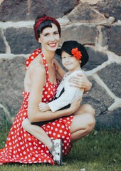 Woman and child in vintage polka dot attire