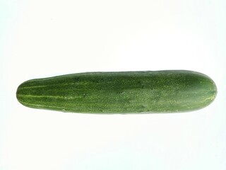 Natural green fresh cucumber fruit, large straight long perfect shape isolated on white background