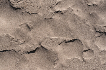 SAND - Grainy surface of a natural mineral
