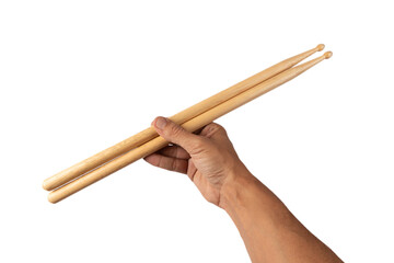 Male hands holding a pair of drum sticks isolated on white background