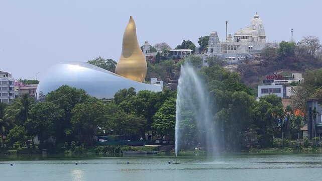 Beautiful view of Hussain Sagar Lake, Amara jyothi Telangana Martyrs Memorial near Secretariat and Birla Mandir in background. Hyderabad, India.