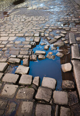 Broken cobbled road